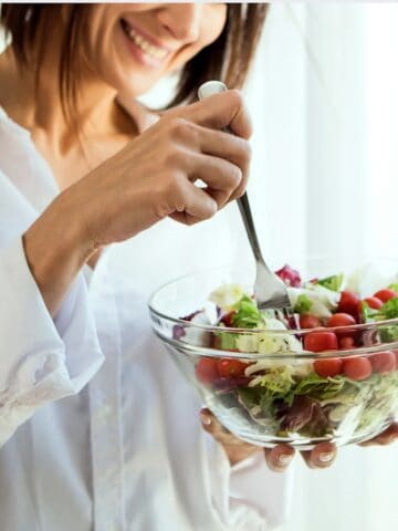 woman eating salad